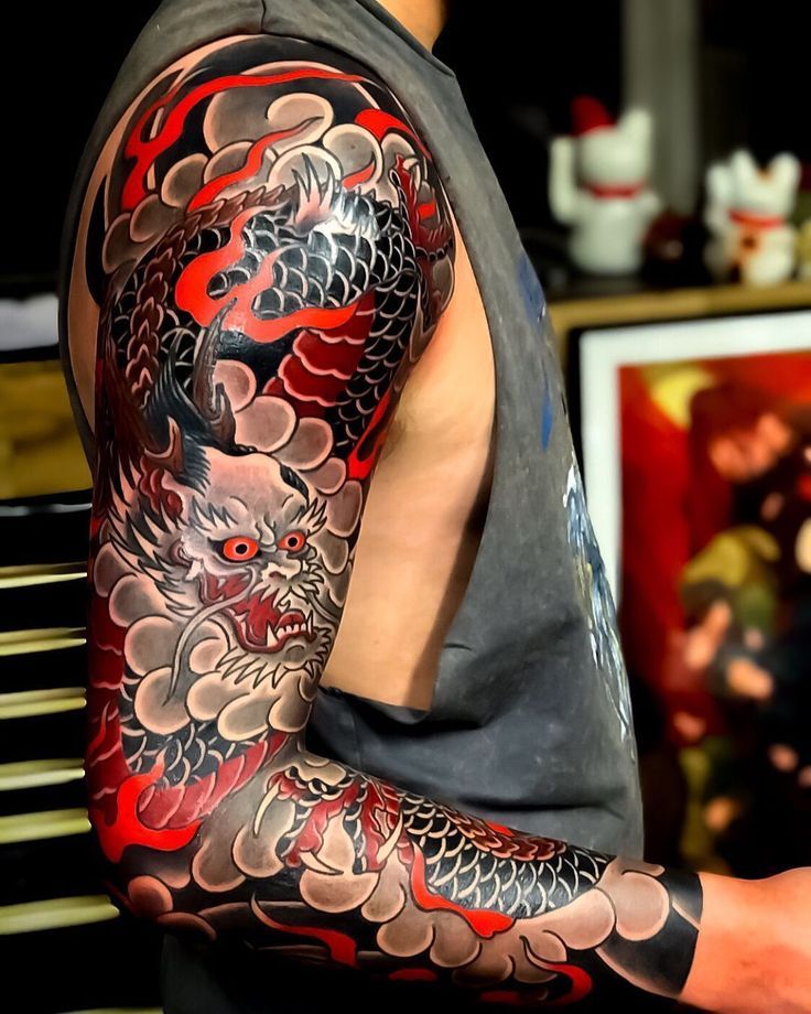 Traditional Japanese Tattoo: Meanings, Symbols & Irezumi Guide 8 Traditional Japanese tattoo composition with waves and background elements