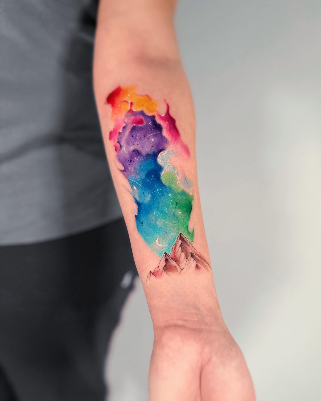 Watercolor Tattoo Guide: Designs, Longevity & Expert Tips 6 Modern watercolor tattoo style with vibrant artistic color effects