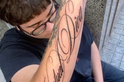 Calligraphy Tattoo Guide: Styles, Meaning & Design Ideas 49975b71e94608f79a8f9fc9d63b6063