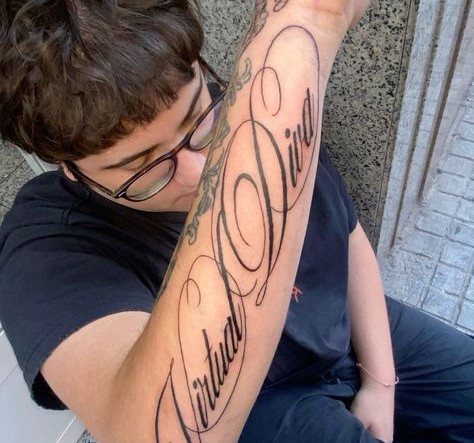 Calligraphy Tattoo Guide: Styles, Meaning & Design Ideas 49975b71e94608f79a8f9fc9d63b6063