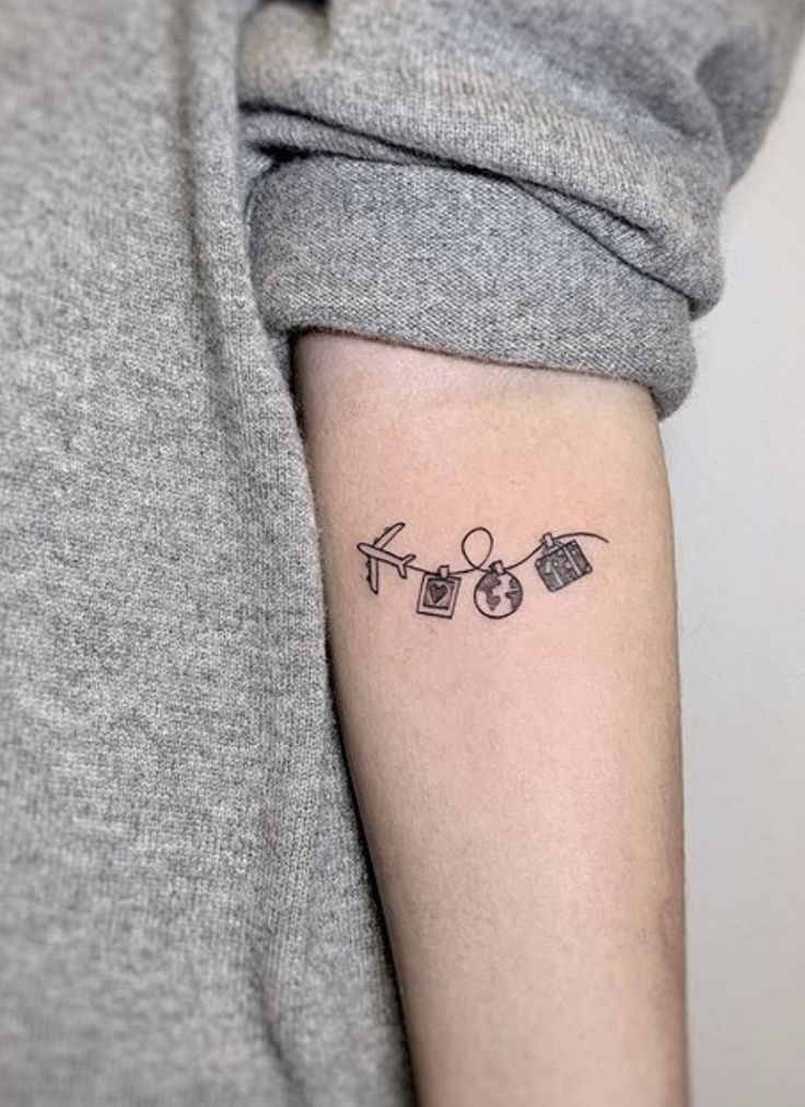 Tiny mountain travel tattoo inspiration