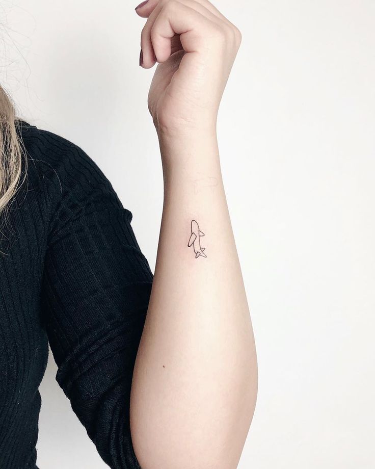 Minimalist Wrist Tattoo Ideas, Meaning & Expert Guide 7 Minimalist wrist tattoo symbol design inspiration