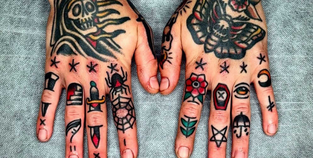 Finger Tattoo Ideas: Stylish, Meaningful & Long-Lasting Designs Finger Tattoos For Men 995x503 2