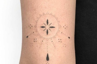 Hand Poked Tattoo Guide: Pain, Healing, Safety & Longevity Hand poked custom tattoo on the forearm