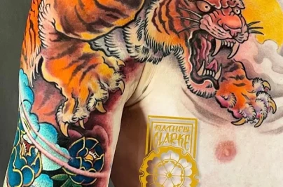 Tiger Tattoo Meaning: Symbolism, Designs & Best Ideas Japanese Tiger front 628x675