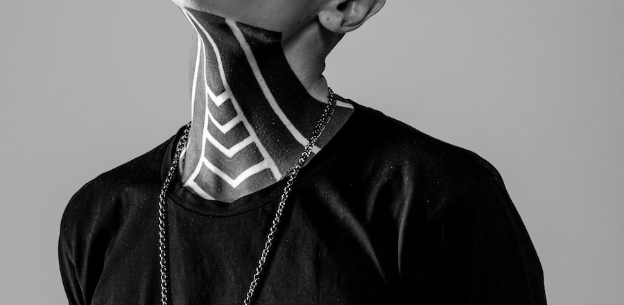 Bold Neck Tattoo Ideas, Meaning & Pain Guide Should I Get a Tattoo On My Neck
