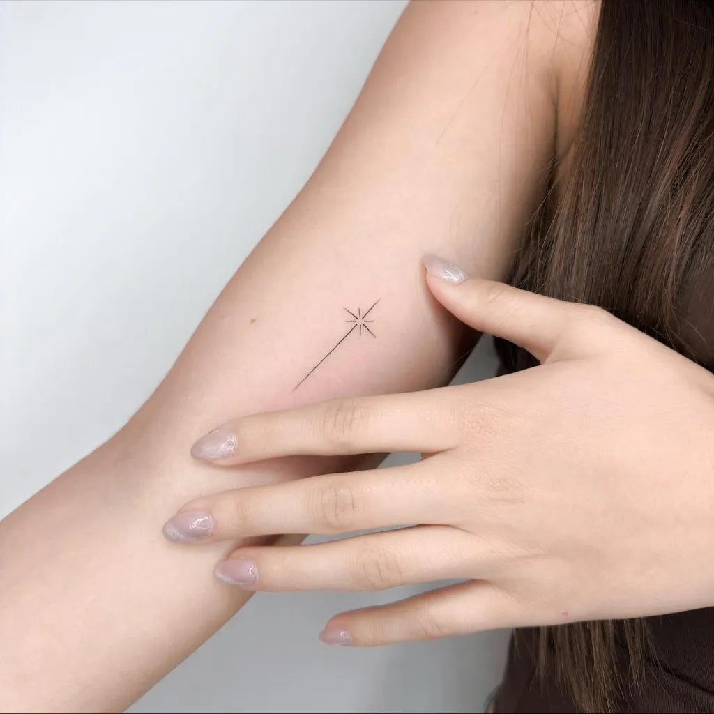 Minimalist Tattoo Ideas: Meanings, Designs & Expert Guide Tiny Minimalist Star on Women Arm Tattoo by ongarato tattoo Tattoobnb