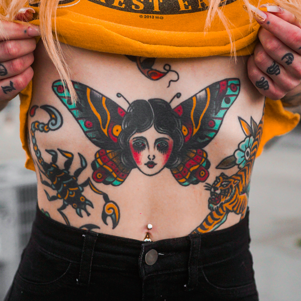 Traditional American Tattoo: History, Meanings & Iconic Designs 9 Traditional American tattoo flash artwork showcasing classic old school designs
