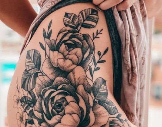 Thigh Tattoo for Women: Meaning, Pain, Placement & Ideas a052fd1336c37ef78a0a6baec7a1240d
