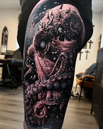 Realism Tattoo From Photo: How to Get Stunning Results 8 Professional realism tattoo artist demonstrating advanced portrait tattoo techniques