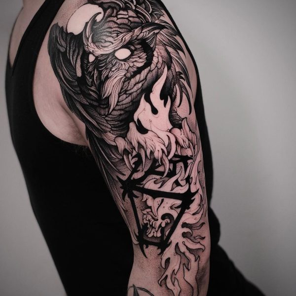 Blackwork Tattoo Guide: Styles, Meaning, Cost & Ideas 6 Modern blackwork tattoo sleeve with geometric and ornamental details