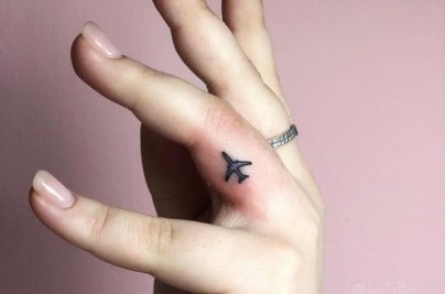 Travel Finger Tattoo Symbols: Meaningful Tiny Ink Ideas for Wanderers c40a816b5ea5b937d0d22fbbe6948786