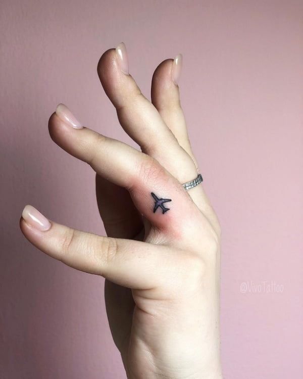 Travel Finger Tattoo Symbols: Meaningful Tiny Ink Ideas for Wanderers c40a816b5ea5b937d0d22fbbe6948786