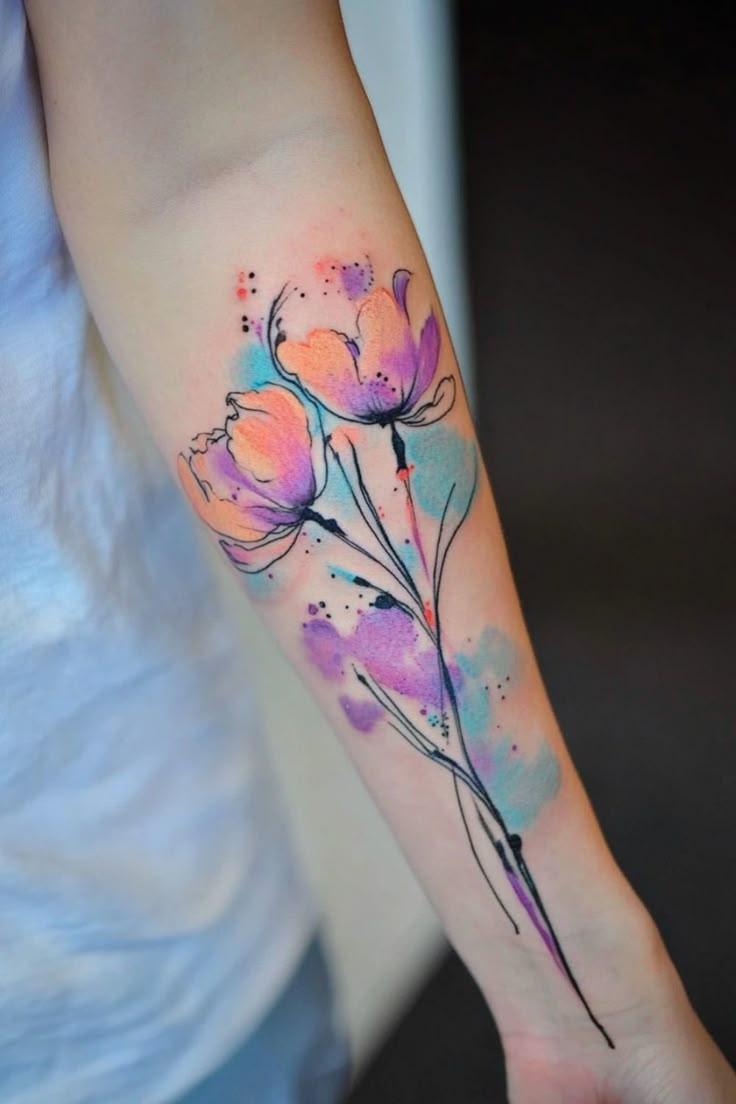 Watercolor Tattoo Guide: Designs, Longevity & Expert Tips 5 Watercolor tattoo artistic color blending design inspiration