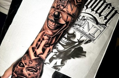 Chicano Style Tattoo: History, Meaning, Symbolism, Designs, and Cultural Significance chicano arm sleeve tattoo cassius 1040x1300