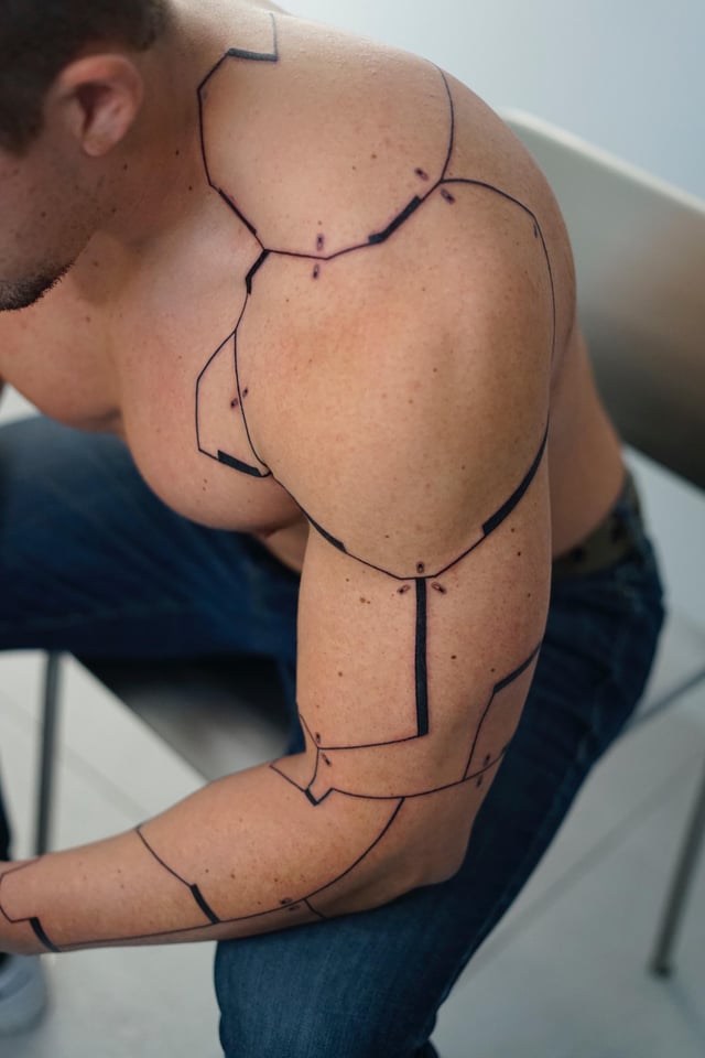 Minimalist cyberpunk cybernetic arm tattoo concept