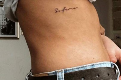 Rib Cage Tattoo Guide: Meaning, Pain & Expert Insights db47b9cde65781be2313f32a5e072c94