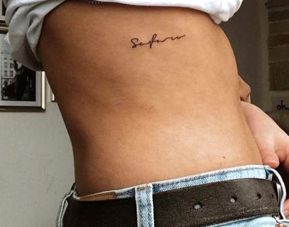 Rib Cage Tattoo Guide: Meaning, Pain & Expert Insights db47b9cde65781be2313f32a5e072c94