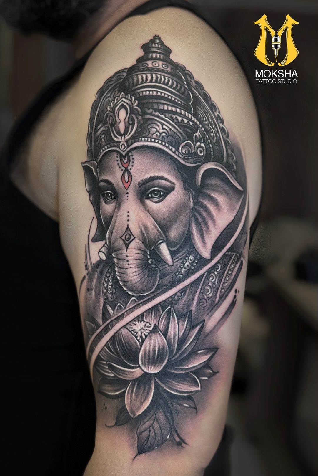 Ganesh Tattoo Meaning, Designs & Spiritual Symbolism Guide ganesha new tattoo e1737570087834