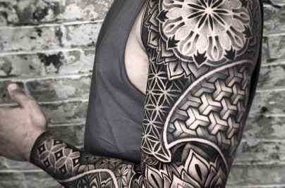 Geometric Tattoo Ideas, Meanings & Expert Design Guide geometric and mandala arm sleeve ludan jiang 1058x1300 2