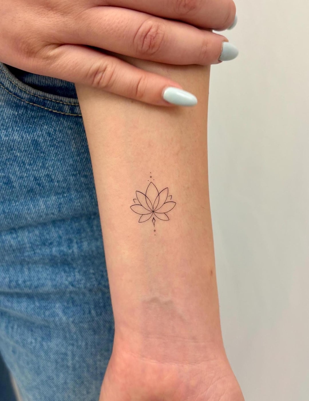 Lotus Flower Tattoo Meaning, Designs & Symbolism Guide
