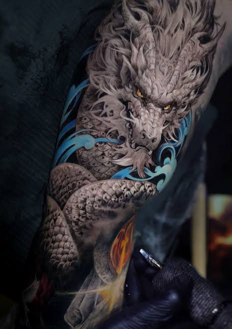 Dragon Tattoo Meaning, Designs & Symbolism Guide 8 Traditional dragon tattoo cultural symbolism
