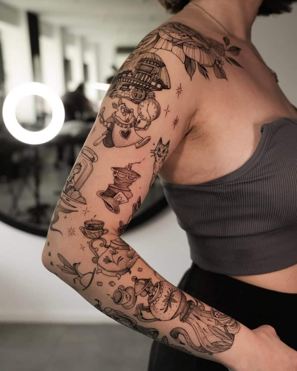Patchwork Tattoo Ideas, Styles & Sleeve Planning Guide 7 Alice in Wonderland themed patchwork tattoo sleeve design inspiration