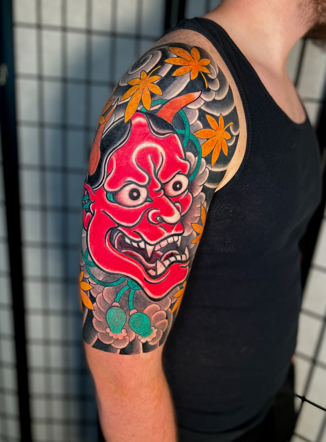 Hannya Mask Tattoo Meaning, Symbolism & Best Design Ideas 6 Red Hannya mask tattoo symbolizing passion intensity and emotional transformation