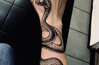 Snake Tattoo Meaning, Symbolism & Best Design Ideas snake tattoos 1