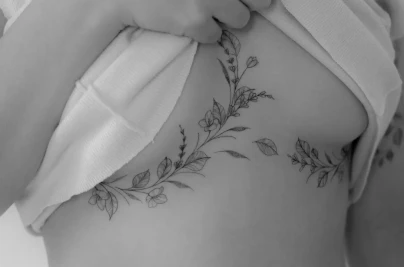 Sternum Tattoo Underboob Guide: Pain, Design & Placement sternum tattoo placement 1