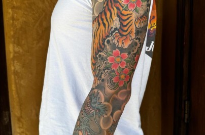 Asian Tiger Dragon Sleeve Tattoo: Meaning, Designs & Ideas tiger dragon sleeve by pete vaca at full circle tattoo v0 dnl5ijh48fdc1