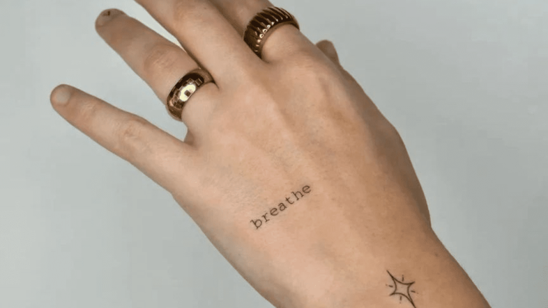 Minimalist Wrist Tattoo: Meaning, Style & Expert Guide wristtattoos d964677f838d4646b312bfa912b31a36